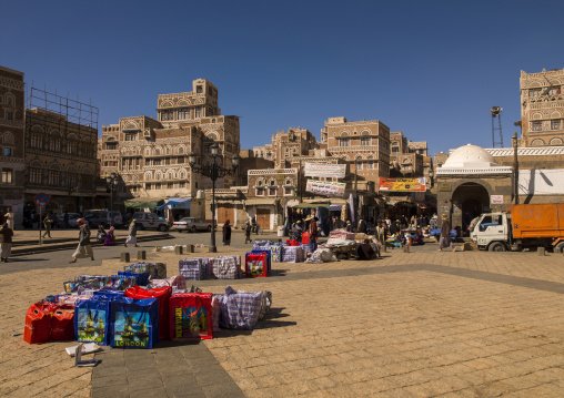 Market in front of traditional mudbrick house, Amanat Al-Asemah, Sanaa, Yemen