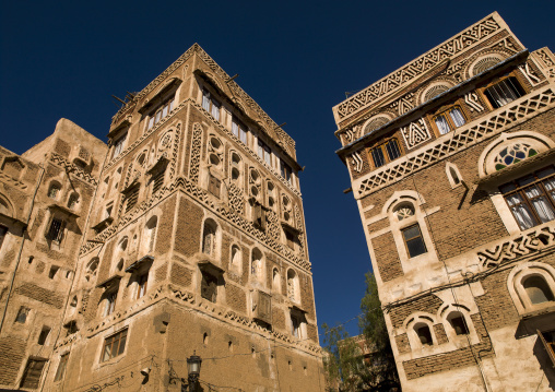 Traditional houses in the old city featuring ornamental facades, Amanat Al-Asemah, Sanaa, Yemen