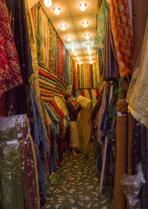 Yemeni man selling fabrics, Amanat Al-Asemah, Sanaa, Yemen