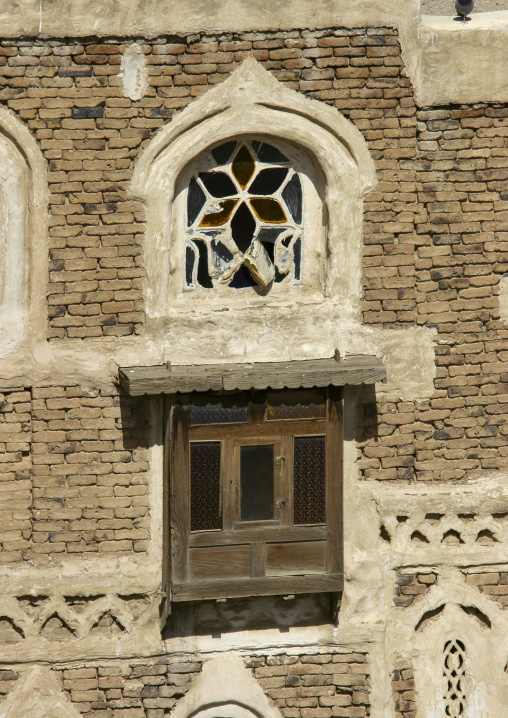 Traditional house in the old city featuring stained-glass windows, Amanat Al-Asemah, Sanaa, Yemen