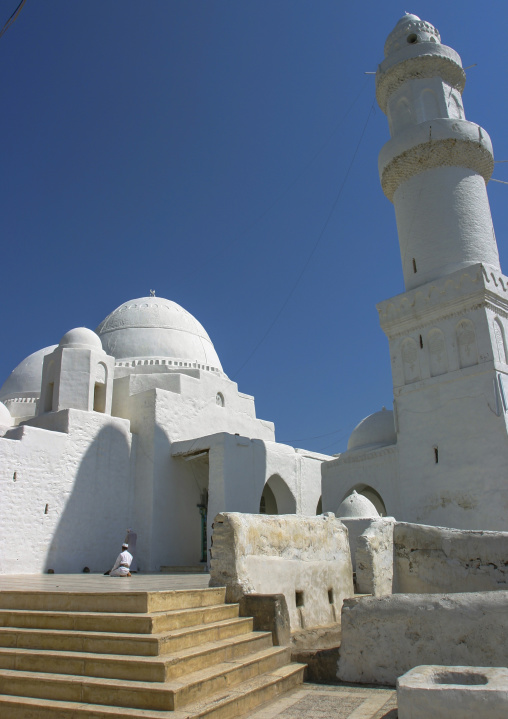 Yemeni man praying in white Mosque of Ahmed Ibn Alwan, Taiz Governorate, Yafrus, Yemen