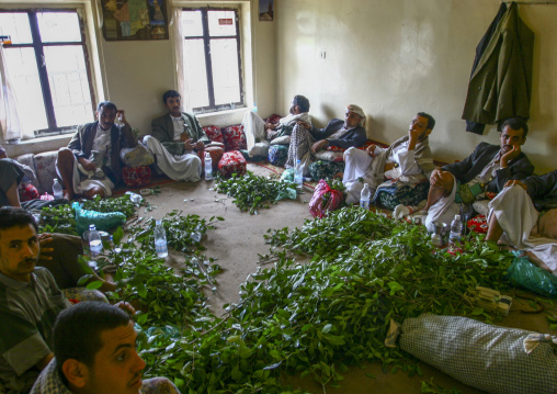Yemeni men chewing qat in a mafraj, Haraz Mountains, Al Hajjarah, Yemen