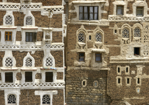 Traditional houses in the old city featuring ornamental facades, Amanat Al-Asemah, Sanaa, Yemen
