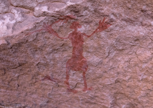 Rock painting depicting a man with a sword, Tassili N'Ajjer National Park, Tadrart Rouge, Algeria