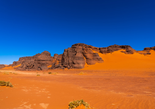 Rocks and sand dunes in Sahara desert, Tassili N'Ajjer National Park, Tadrart Rouge, Algeria