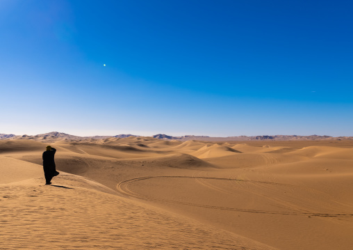 Tuareg in the sand dunes in Sahara desert, North Africa, Erg Admer, Algeria
