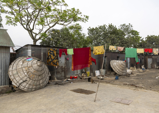 Mounds of rice with giant hat-shaped bamboo cones, Chittagong Division, Ashuganj, Bangladesh