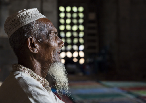 Bangladeshi muslim man with a white beard inside Kusumba mosque, Naogaon District, Manda Upazila, Bangladesh