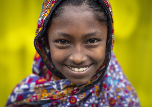 Portrait of a smiling bangladeshi girl from Jhautala slum, Chittagong Division, Chittagong, Bangladesh