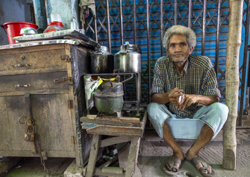 Portrait of a bangladeshi man selling tea in the street, Dhaka Division, Dhaka, Bangladesh