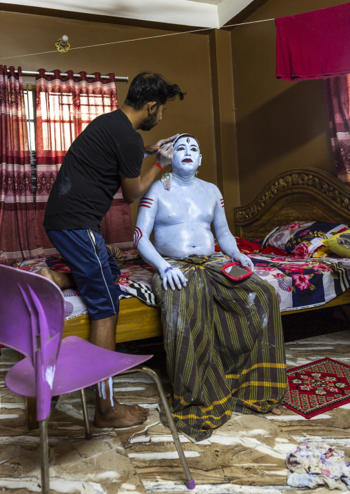 Make up of a hindu devotee who becomes Lord Shiva at Lal Kach festival, Dhaka Division, Munshiganj, Bangladesh