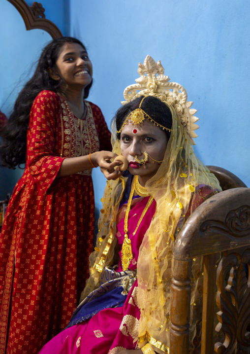 Make up of Parvati wife of Lord Shiva played by a man during Lal Kash festival, Dhaka Division, Munshiganj, Bangladesh