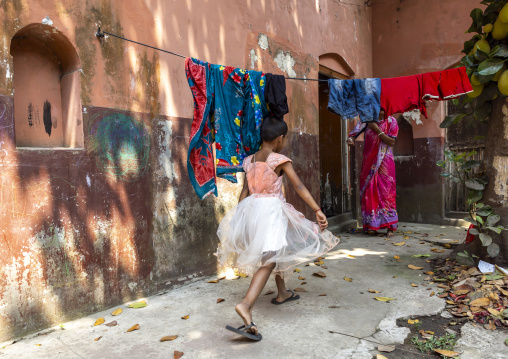 Bangladeshi girl with a ballerina dress in the street, Dhaka Division, Munshiganj, Bangladesh
