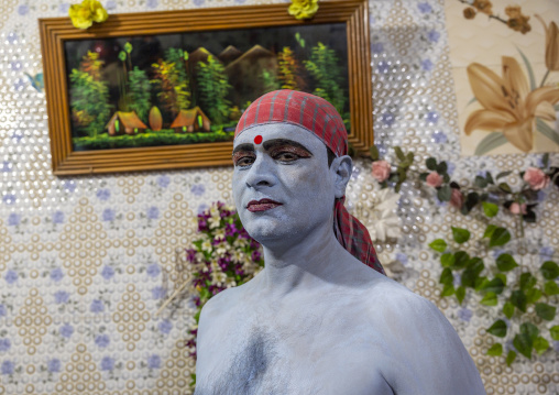 Make up of a hindu devoteei  who becomes Lord Shiva at Lal Kach festival, Dhaka Division, Munshiganj, Bangladesh