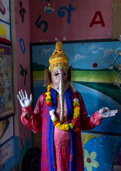 Devotee dressed as Ganesh in a school for Charak Puja hindu festival, Sylhet Division, Kamalganj, Bangladesh