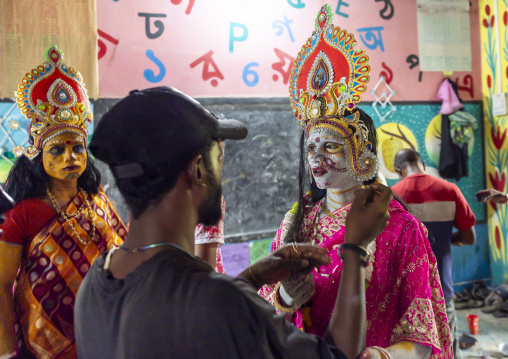 Devotees dressing as Lakshmi in a school for Charak Puja hindu festival, Sylhet Division, Sylhet, Bangladesh