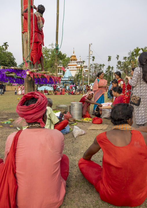 Devotees making offerings before body suspension during Charak Puja, Sylhet Division, Kamalganj, Bangladesh