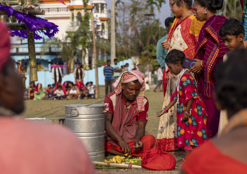 Devotees making offerings before body suspension during Charak Puja, Sylhet Division, Kamalganj, Bangladesh