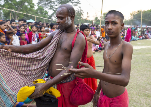 Devotees begging for money during Charak Puja hindu festival, Sylhet Division, Kamalganj, Bangladesh