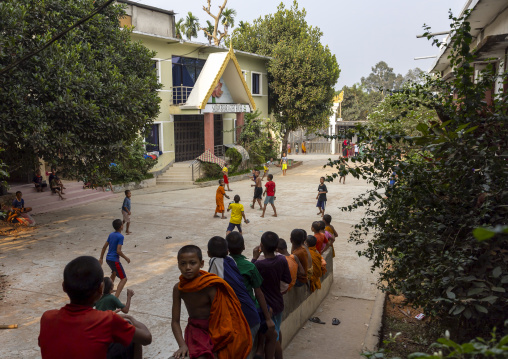 Orphans boys playing football  in Shalban Buddhist Monastery, Chittagong Division, Comilla, Bangladesh