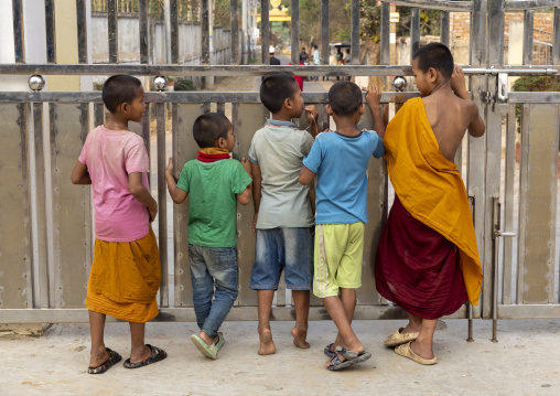 Orphans boys in Shalban Buddhist Monastery gate, Chittagong Division, Comilla, Bangladesh