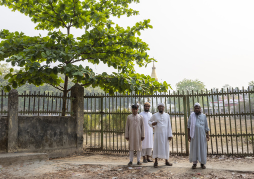 Muslim men in front of a Shalban Buddhist Monastery, Chittagong Division, Comilla, Bangladesh