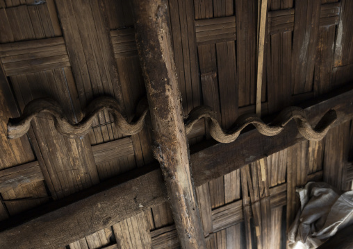 Crooked stick in a house to protect the Tanchangya family, Chittagong Division, Bandarban, Bangladesh