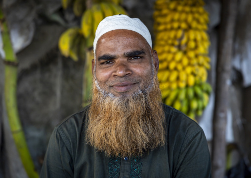 Portrait of a bangladeshi man with beard and hair dyed in henna, Chittagong Division, Bandarban, Bangladesh