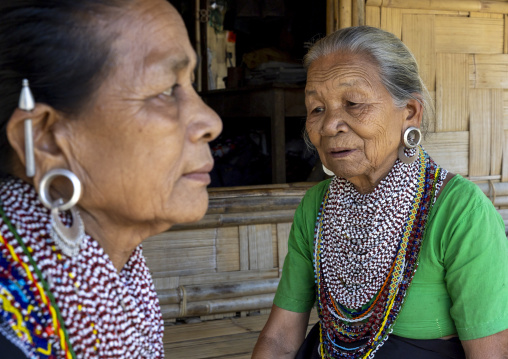 Tripura tribe woman with traditional necklaces and earrings, Chittagong Division, Rowangchhari, Bangladesh