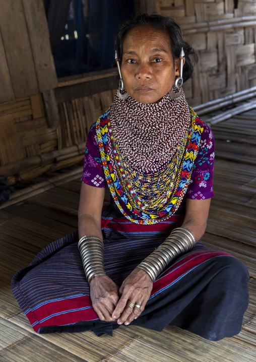Portrait of a Tripura tribe woman with traditional necklaces and earrings, Chittagong Division, Rowangchhari, Bangladesh