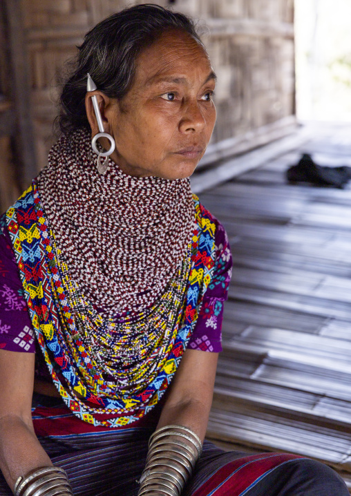 Portrait of a Tripura tribe woman with traditional necklaces and earrings, Chittagong Division, Rowangchhari, Bangladesh