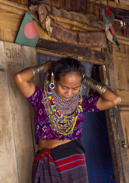 Tripura tribe woman with traditional necklaces and earrings, Chittagong Division, Rowangchhari, Bangladesh