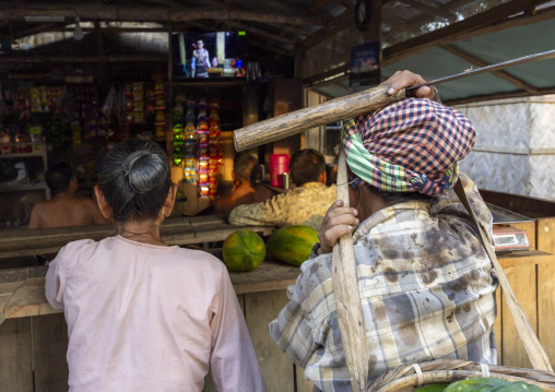 Marma ethnic group people watching television, Chittagong Division, Rowangchhari, Bangladesh