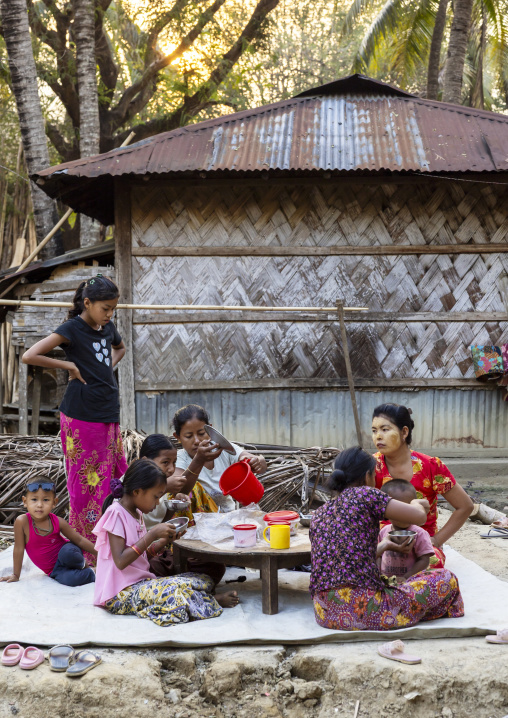 Marma people eating in a small street restaurant, Chittagong Division, Rowangchhari, Bangladesh