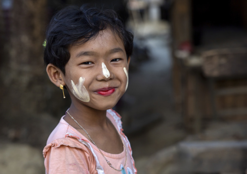 Portrait of a Marma ethnic group girl with thanaka on the face, Chittagong Division, Rowangchhari, Bangladesh