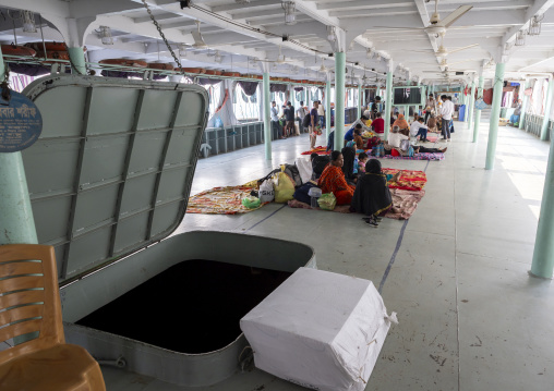 Passengers waiting on the dock of annchored ferry vessels at the dockyard, Dhaka Division, Dhaka, Bangladesh