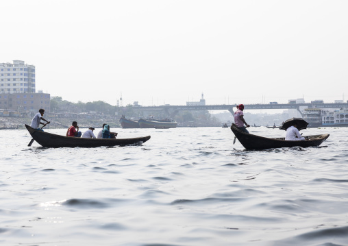 Bangladeshi people on canoes on Buriganga river, Dhaka Division, Dhaka, Bangladesh
