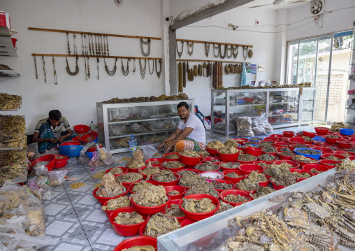 Metal worker using old lost wax casting method to create jewels, Dhaka Division, Dhamrai, Bangladesh