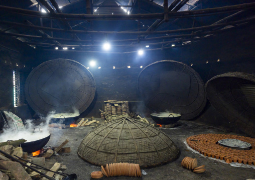 Clay pots around a bonfire to make traditional yogurt, Rajshahi Division, Bogura, Bangladesh