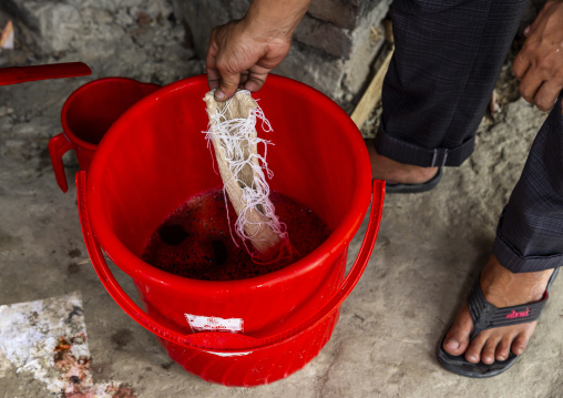 Shawl made with red tie-dye resist dyeing technique in Living Blue, Rangpur Division, Goalpara, Bangladesh