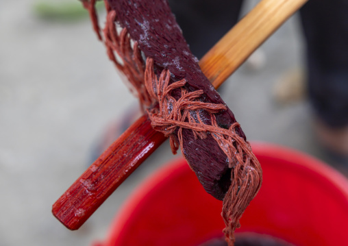 Shawl made with red tie-dye resist dyeing technique in Living Blue, Rangpur Division, Goalpara, Bangladesh