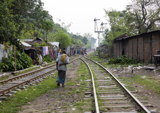 Bangladeshi people living along a railway track in a slum, Rangpur Division, Rangpur, Bangladesh