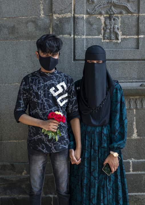 Young muslim couple in Kusumba Mosque, Rajshahi Division, Kusumba, Bangladesh