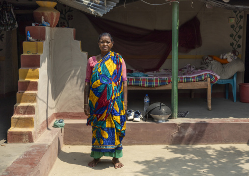 Christian woman from Santal ethnic group in a decorated house, Rajshahi Division, Tanore, Bangladesh