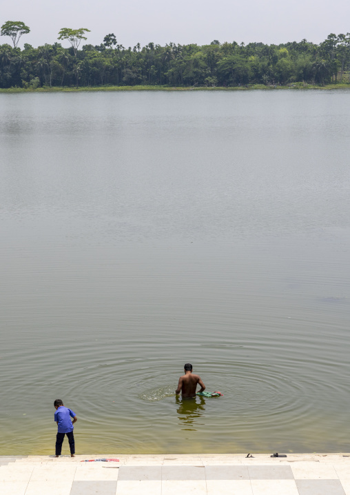 Bangladshi people bathing in Mausoleum of Khan Jahan pond, Khulna Division, Bagerhat, Bangladesh