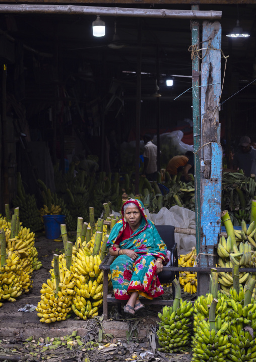 Bangladeshi old woman selling bananas in at Kawran Bazar, Dhaka Division, Dhaka, Bangladesh