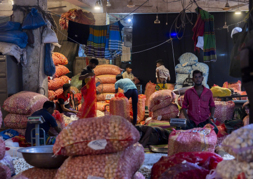 Bangladeshi men selling onions at Kawran Bazar, Dhaka Division, Dhaka, Bangladesh