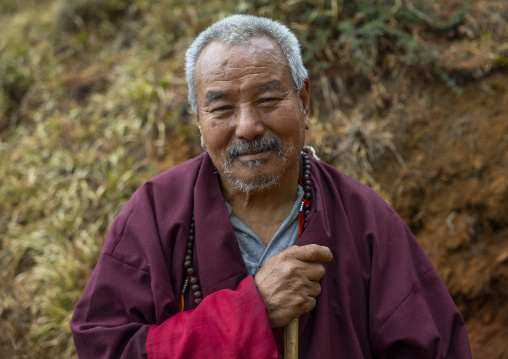 Bhutanese man hiking in the mountain, Paro, Drakarpo, Bhutan