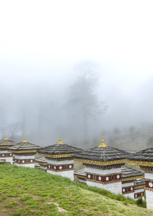 Dochula with 108 stupas or chortens in the fog, Punakha, Dochula Pass, Bhutan