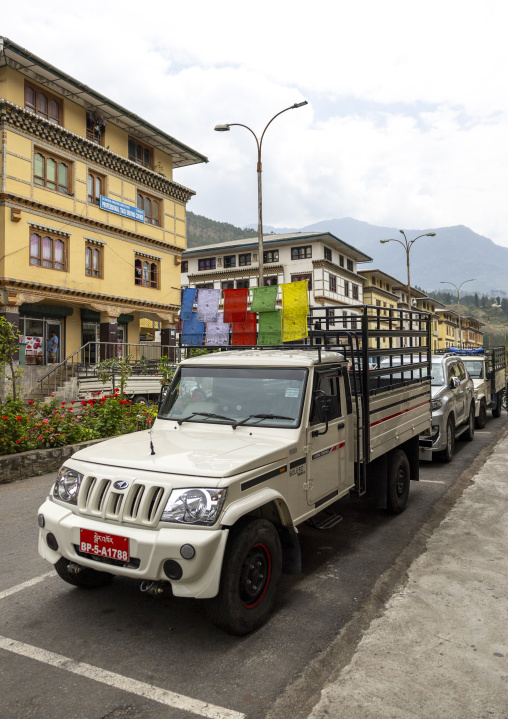 Car decorated with prayer flags, Thedtsho Gewog, Wangdue Phodrang, Bhutan